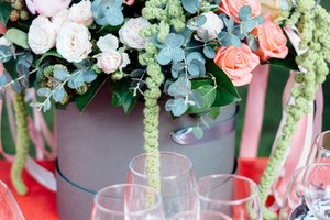 Soft pink roses, white lilies, and eucalyptus